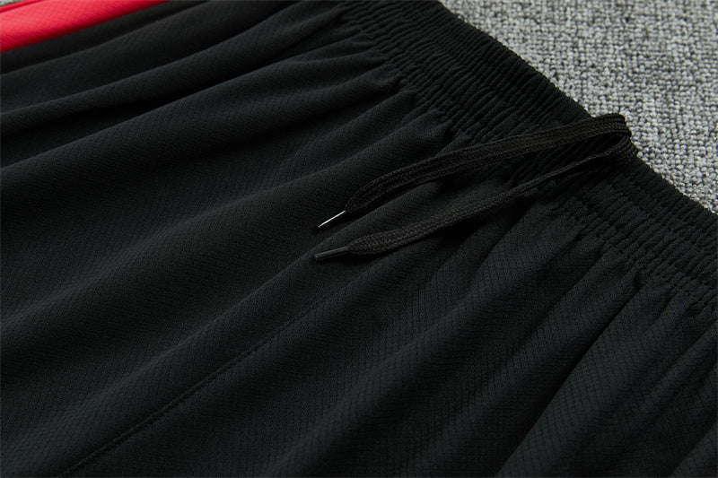 Conjunto Brasil 2026/2027 – Negro/Rojo Entrenamiento