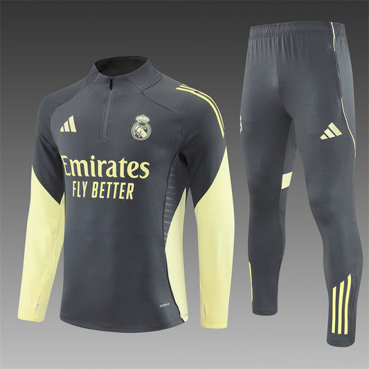REAL MADRID – CONJUNTO DE ENTRENAMIENTO GRIS/AMARILLO 2025/26