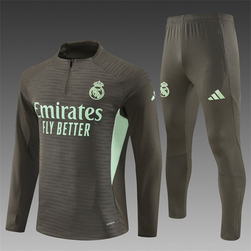 Real Madrid 25/26 – Chándal de entrenamiento tono carbón con detalles verde menta