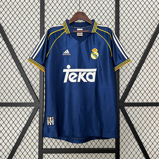 Camiseta Retro Real Madrid 1999/2000 – Segunda Equipación “Champions Glory”