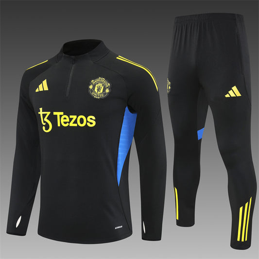 MANCHESTER UNITED – CONJUNTO DE ENTRENAMIENTO NEGRO/AMARILLO 2025/26